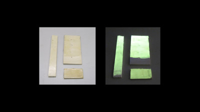 Wood Coated by Polystyrene Embedding CdS Quantum-Dots under VIS/UV Light